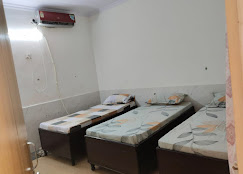 Krishna Boys PG Bedroom