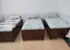 Krishna Boys PG Bedroom
